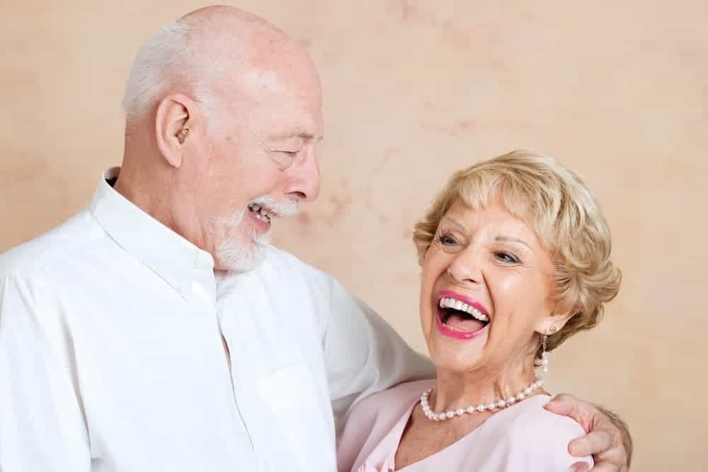 Happy couple after a denture appointment in Long Beach CA