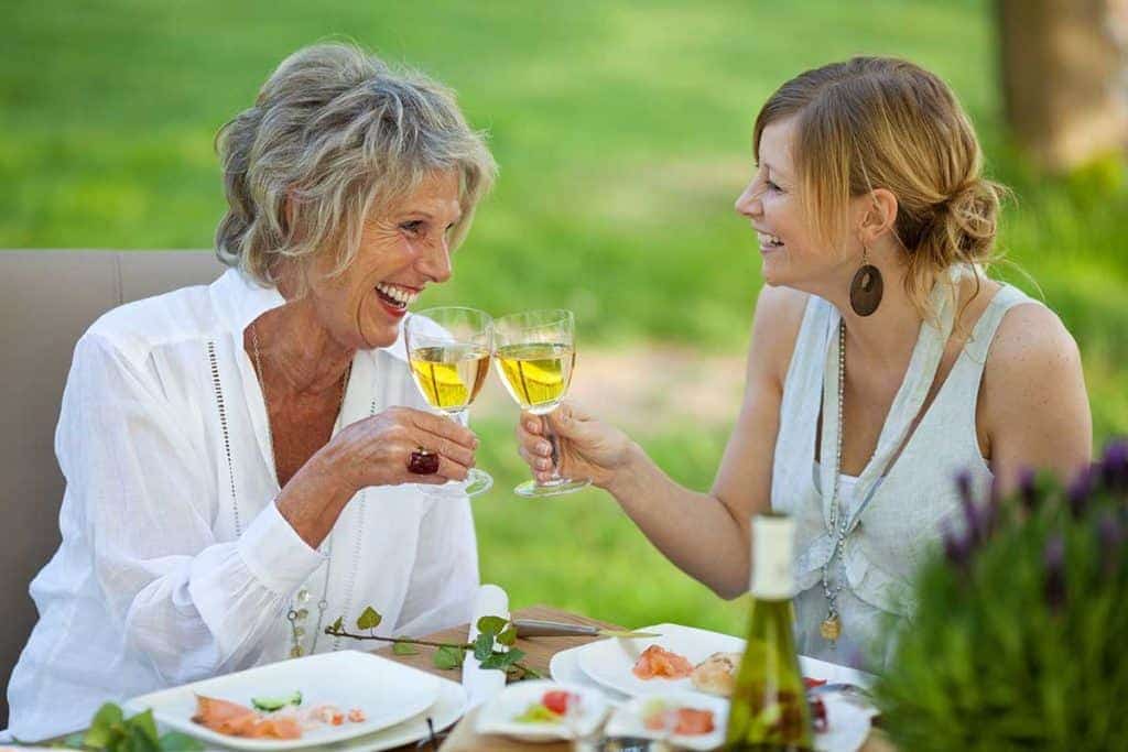 Long Beach dental patient having a glass of wine