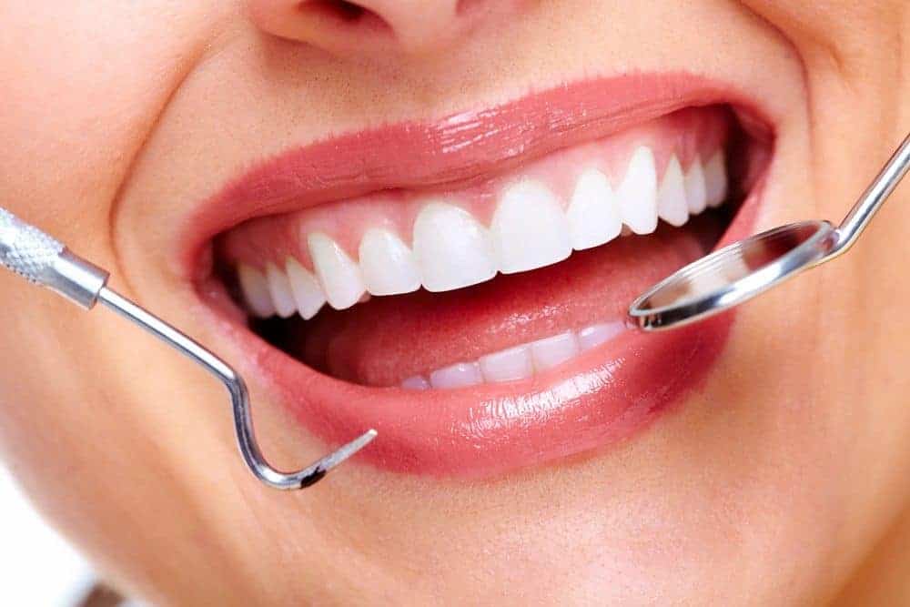 Smiling woman after dental cleaning